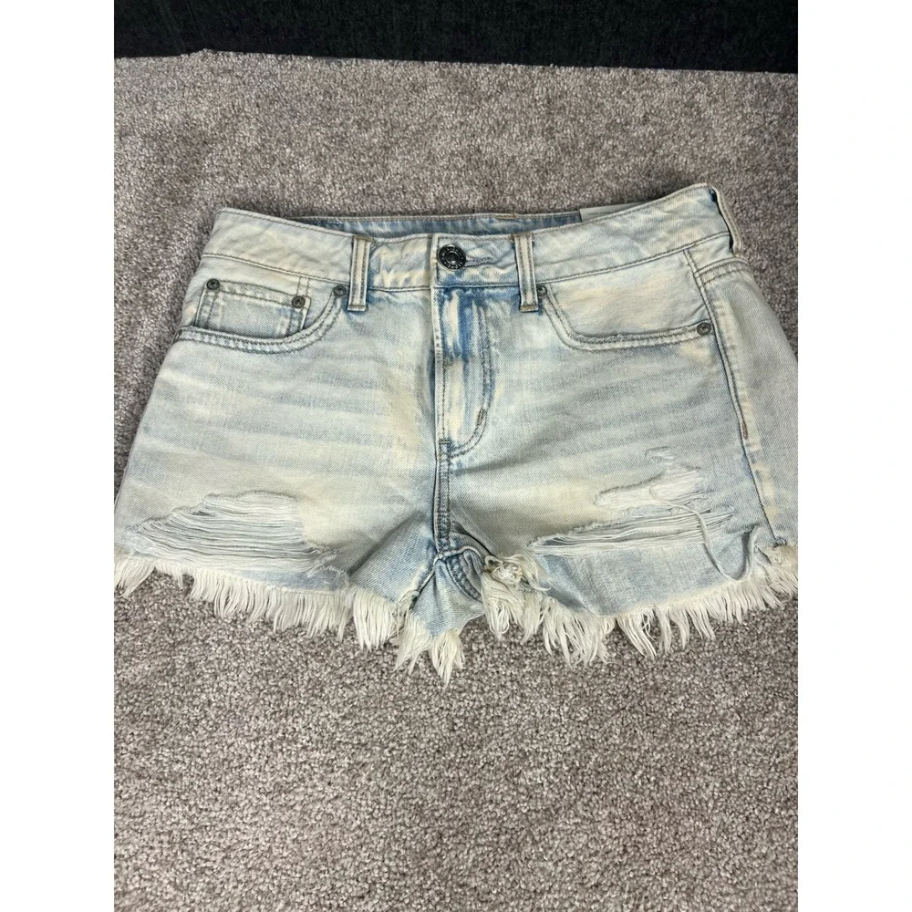 American Eagle Tomgirl Shortie Shorts Denim Blue Ripped Womens Sz 2 NWT - Picture 1 of 3